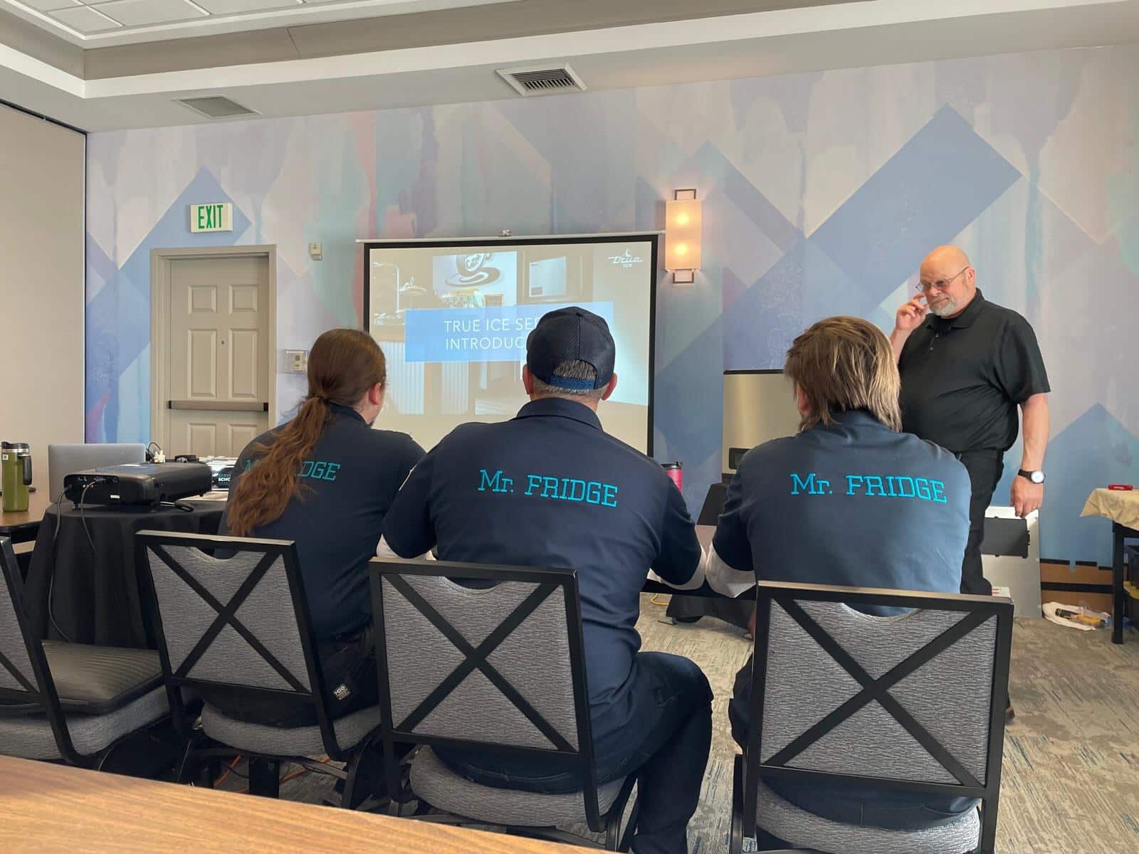 Mr. Fridge team attending a refrigeration equipment training session